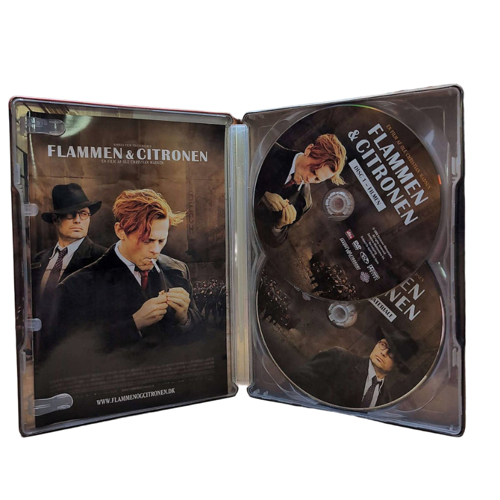 Flammen og Citronen Speciel Version i Metal Æske og 2 Diske